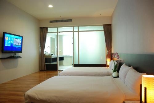 Imagen de la habitación del Hotel New Taipei Hot Spring. Foto 7