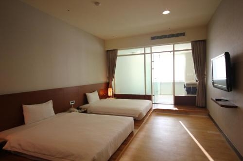 Imagen de la habitación del Hotel New Taipei Hot Spring. Foto 9