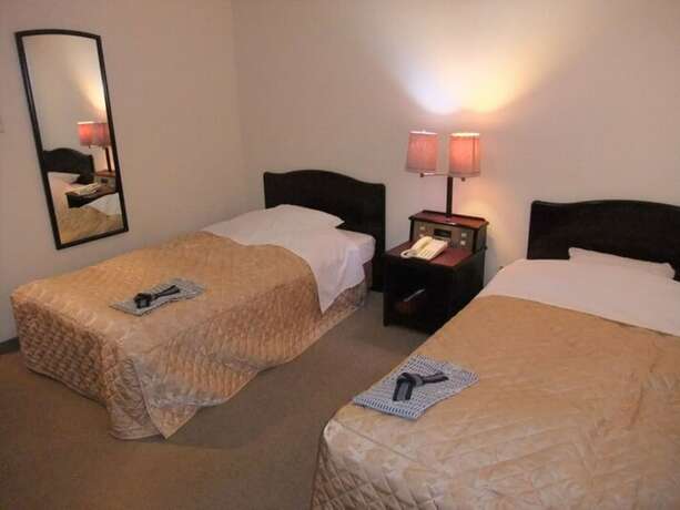 Imagen de la habitación del Hotel New Takahashi Kouyadai. Foto 7