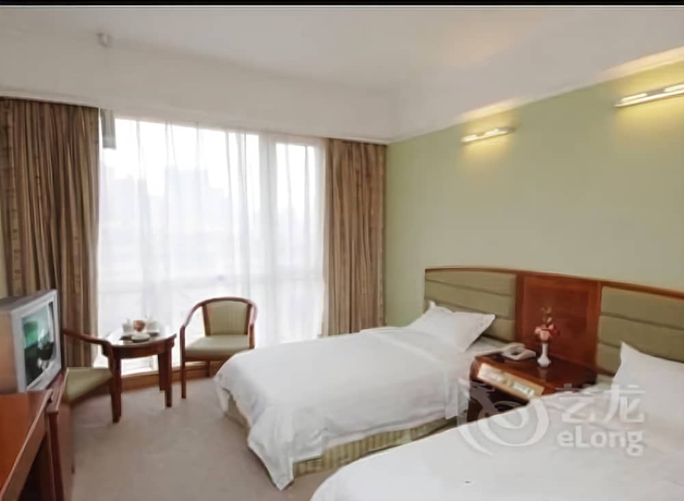 Imagen de la habitación del Hotel New Tian He. Foto 5