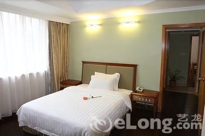 Imagen de la habitación del Hotel New Tian He. Foto 7