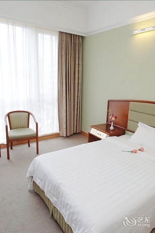 Imagen de la habitación del Hotel New Tian He. Foto 10