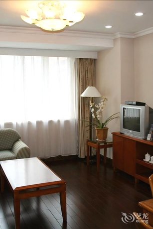 Imagen de la habitación del Hotel New Tian He. Foto 14