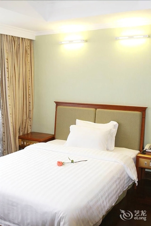 Imagen de la habitación del Hotel New Tian He. Foto 16