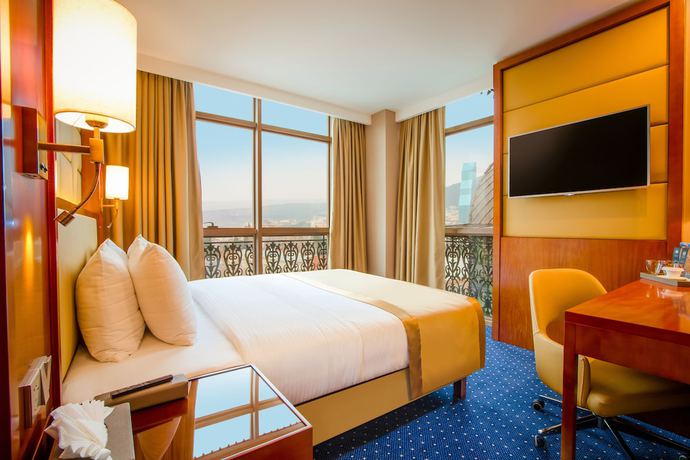 Imagen de la habitación del Hotel New Tiflis. Foto 2