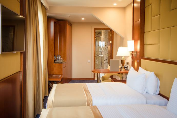 Imagen de la habitación del Hotel New Tiflis. Foto 12