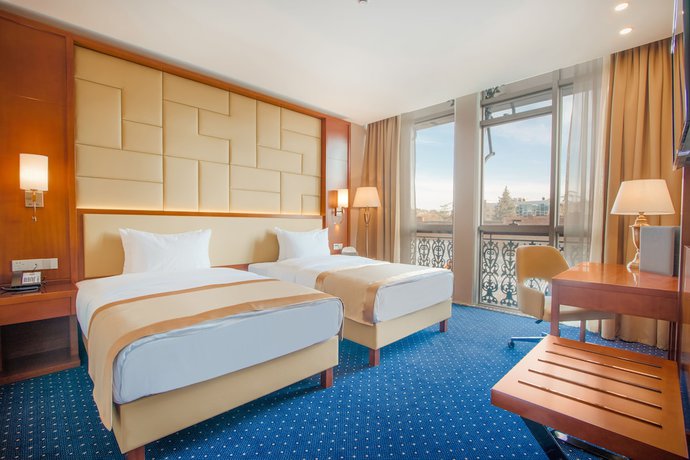 Imagen de la habitación del Hotel New Tiflis. Foto 17