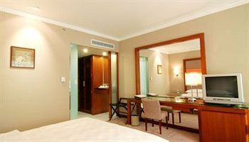 Imagen de la habitación del Hotel New Times. Foto 11