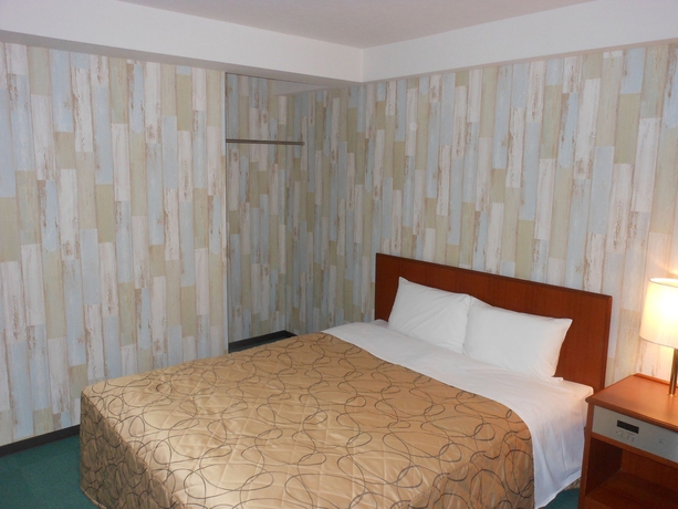 Imagen de la habitación del Hotel New Touhoku. Foto 10