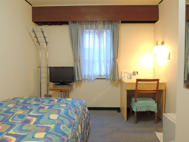 Imagen de la habitación del Hotel New Touhoku. Foto 11