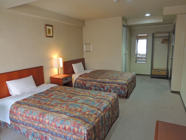 Imagen de la habitación del Hotel New Touhoku. Foto 13