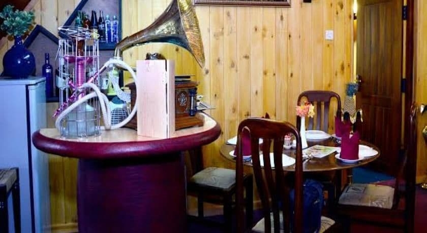 Imagen del bar/restaurante del Hotel New Tour Inn. Foto 1