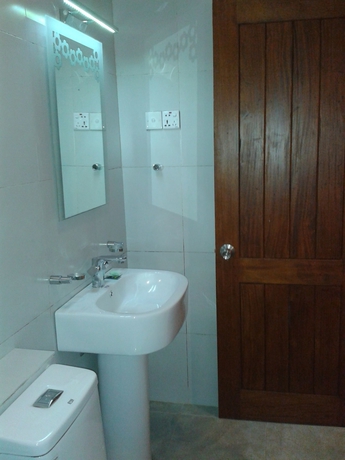 Imagen de la habitación del Hotel New Tour Inn. Foto 2
