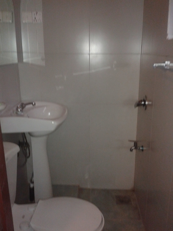 Imagen de la habitación del Hotel New Tour Inn. Foto 3