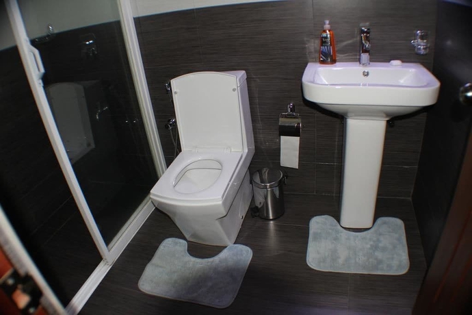 Imagen de la habitación del Hotel New Tour Inn. Foto 4