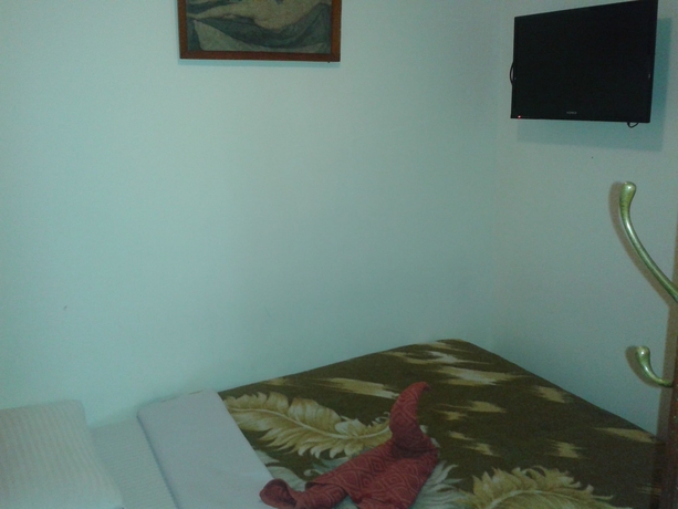 Imagen de la habitación del Hotel New Tour Inn. Foto 5