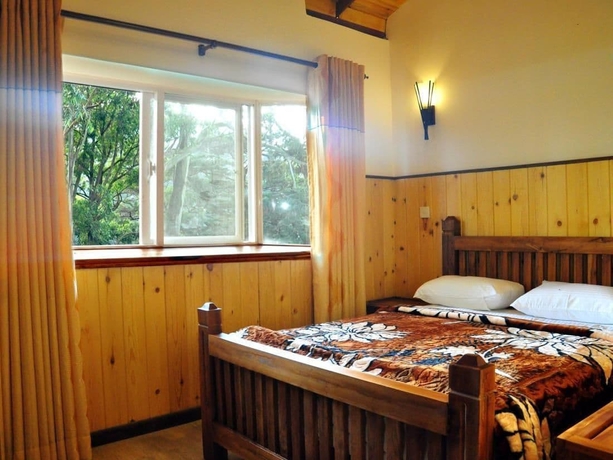 Imagen de la habitación del Hotel New Tour Inn. Foto 6