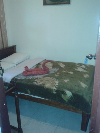 Imagen de la habitación del Hotel New Tour Inn. Foto 8