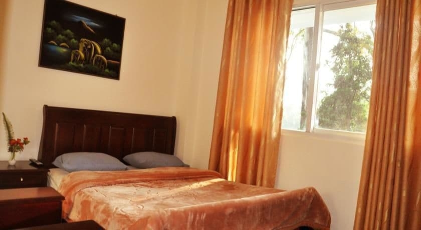 Imagen de la habitación del Hotel New Tour Inn. Foto 12