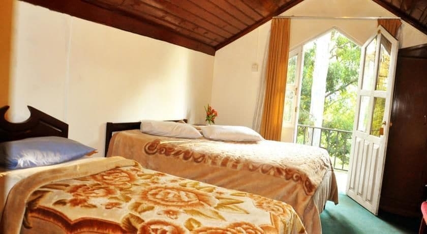 Imagen de la habitación del Hotel New Tour Inn. Foto 14