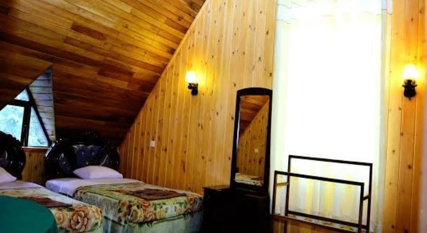 Imagen de la habitación del Hotel New Tour Inn. Foto 15