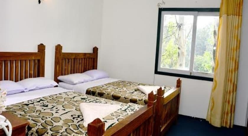 Imagen de la habitación del Hotel New Tour Inn. Foto 16