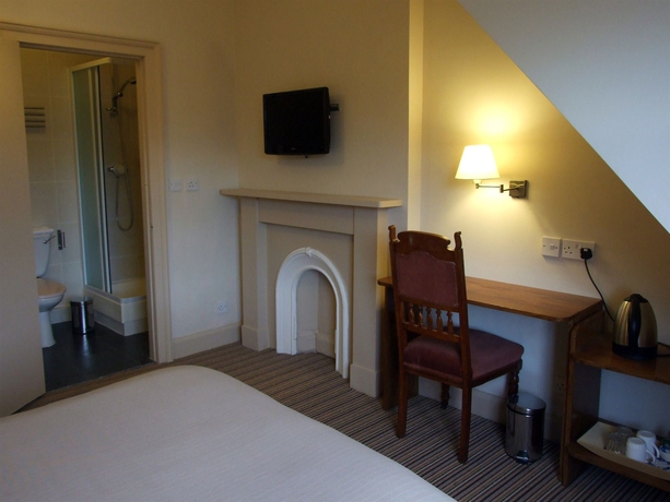 Imagen de la habitación del Hotel New Town Guest House. Foto 3