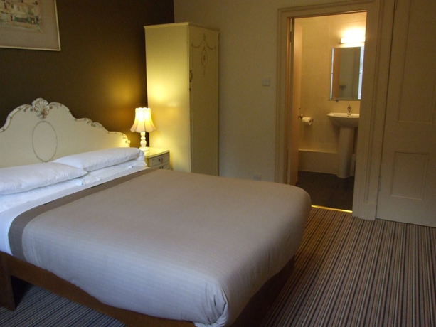Imagen de la habitación del Hotel New Town Guest House. Foto 9