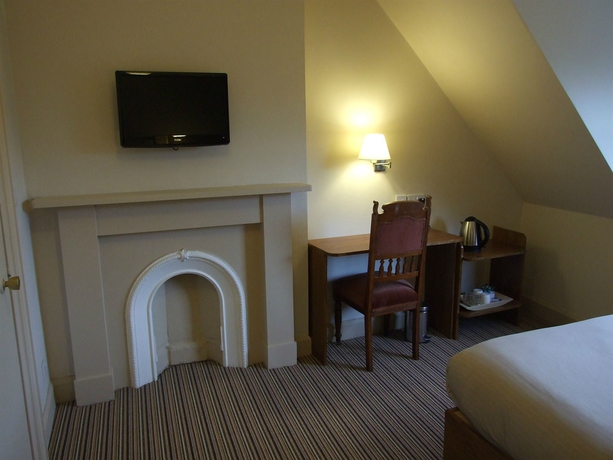 Imagen de la habitación del Hotel New Town Guest House. Foto 12