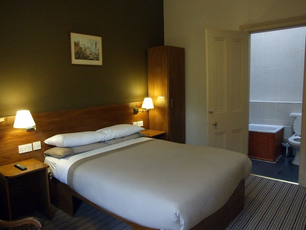 Imagen de la habitación del Hotel New Town Guest House. Foto 13
