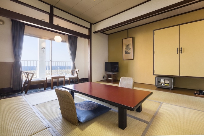 Imagen de la habitación del Hotel New Tsuruta. Foto 2