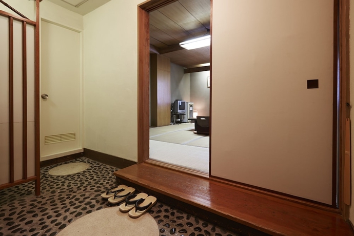 Imagen de la habitación del Hotel New Tsuruta. Foto 4