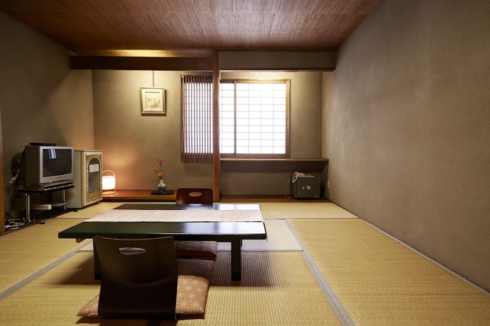 Imagen de la habitación del Hotel New Tsuruta. Foto 5