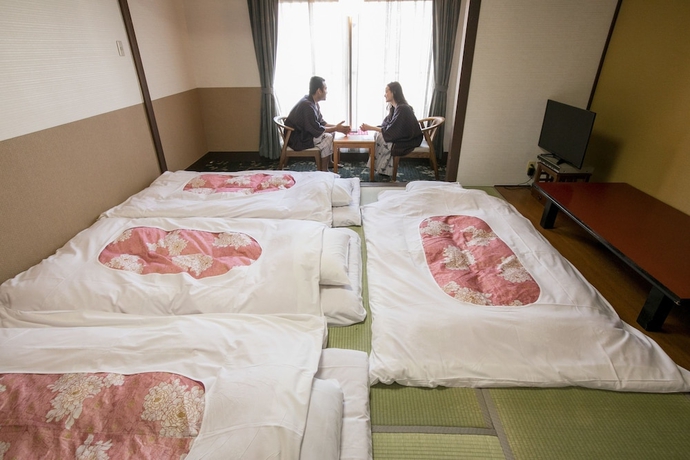 Imagen de la habitación del Hotel New Tsuruta. Foto 7