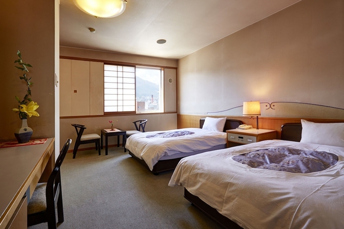 Imagen de la habitación del Hotel New Tsuruta. Foto 8