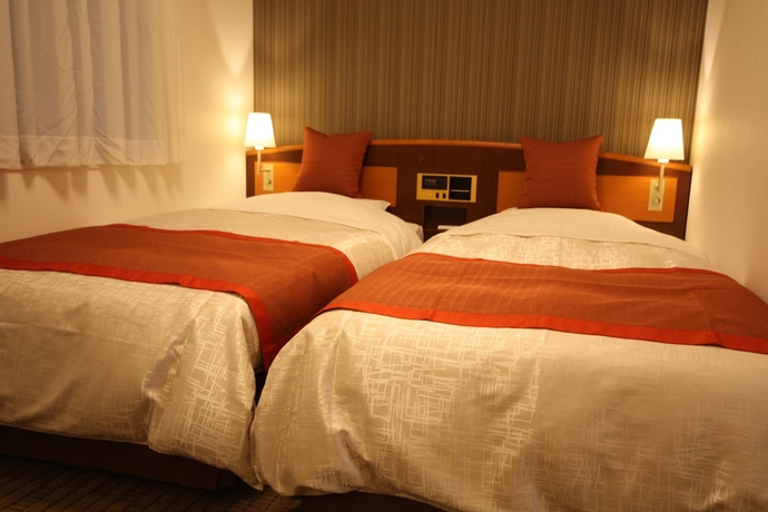 Imagen de la habitación del Hotel New Ueno. Foto 12