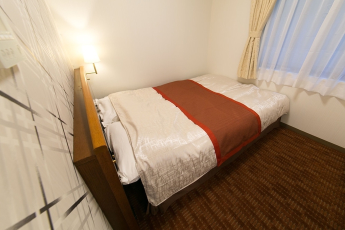 Imagen de la habitación del Hotel New Ueno. Foto 13