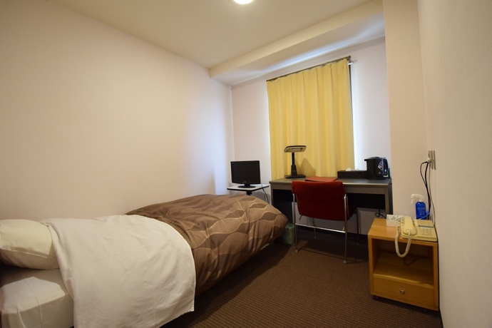 Imagen de la habitación del Hotel New Umeya. Foto 6