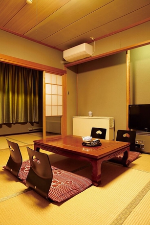 Imagen de la habitación del Hotel New Umeya. Foto 7