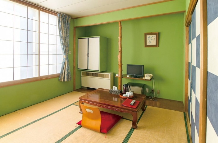 Imagen de la habitación del Hotel New Umeya. Foto 8