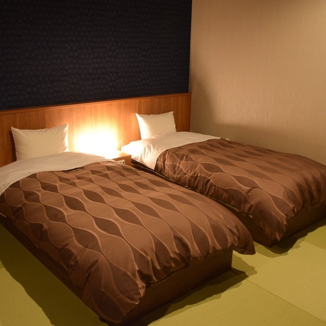 Imagen de la habitación del Hotel New Umeya. Foto 10