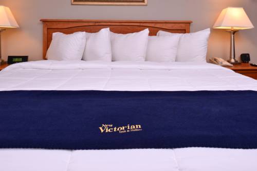 Imagen de la habitación del Hotel New Victorian Inn and Suites, Omaha. Foto 4