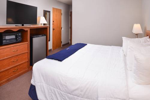 Imagen de la habitación del Hotel New Victorian Inn and Suites, Omaha. Foto 5