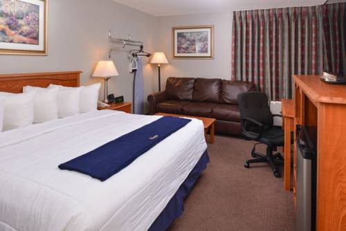 Imagen de la habitación del Hotel New Victorian Inn and Suites, Omaha. Foto 6
