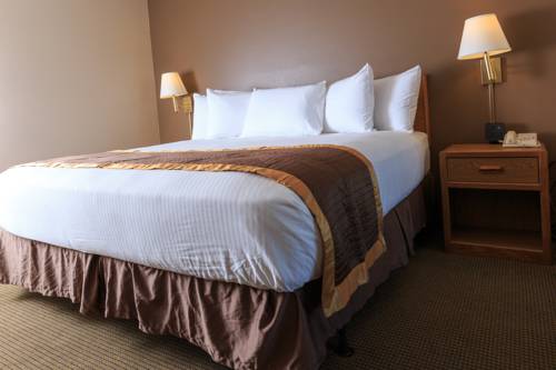 Imagen de la habitación del Hotel New Victorian Suites. Foto 10