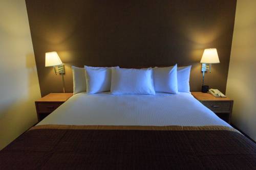 Imagen de la habitación del Hotel New Victorian Suites. Foto 13