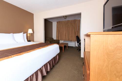 Imagen de la habitación del Hotel New Victorian Suites. Foto 14