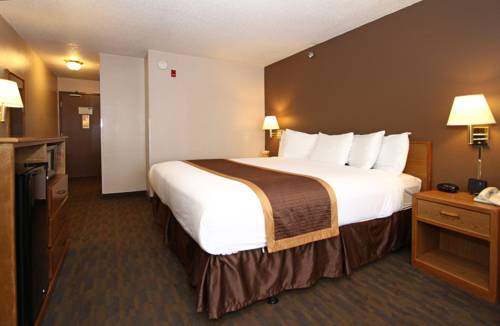 Imagen de la habitación del Hotel New Victorian Suites. Foto 16