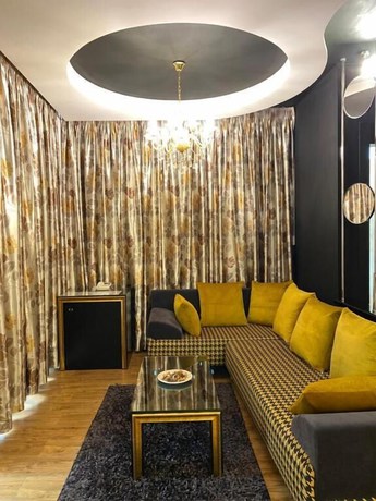 Imagen de la habitación del Hotel New W, Tirana. Foto 2