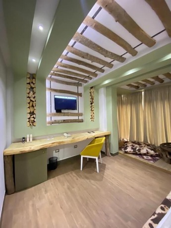 Imagen de la habitación del Hotel New W, Tirana. Foto 5